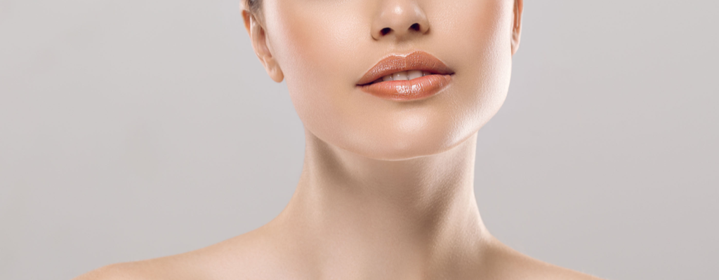 female with a strong, contoured jaw after chin and neck liposuction